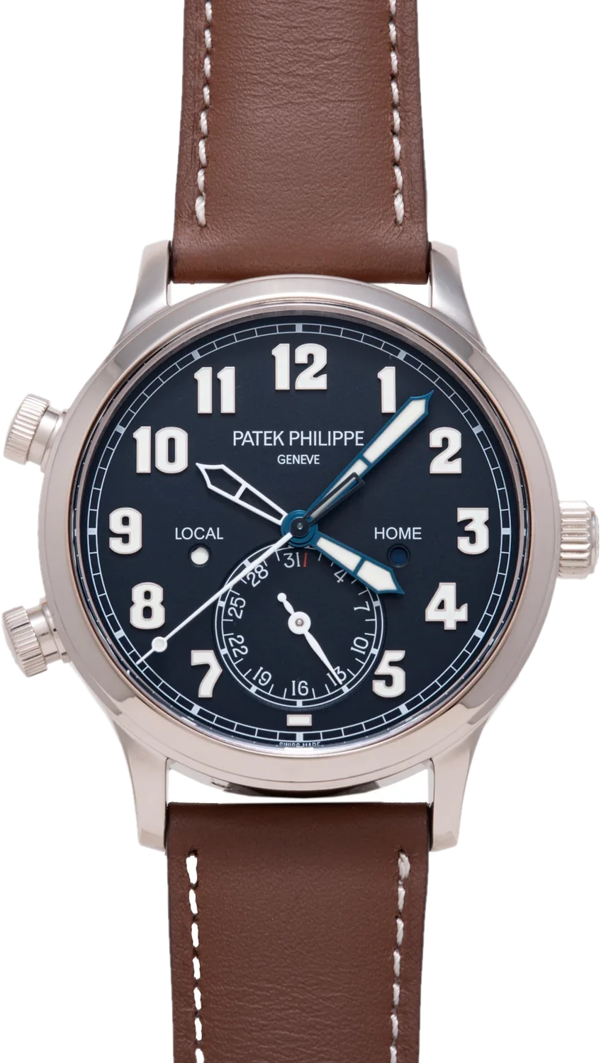 Patek Philippe Calatrava Pilot Travel Time watch with a dark blue dial on a brown leather strap
